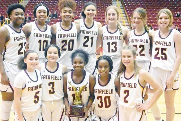 The Lady Eagles are all smiles with the gold trophy after going 4-0 in the Fairfield Tournament. Pictured front row, from left, are Jalynn Calloway, Jarahle Daniels,Charlee Brackens, Jimilyah Nash and Addie Cox; back row, Emori Davis, Breyunna Dowell, Shadasia Brackens, McKinna Brackens, Avery Thaler, Cooper Lawley and Addison Posey, Photo by Mitchell Pate/ Fairfield Recorder