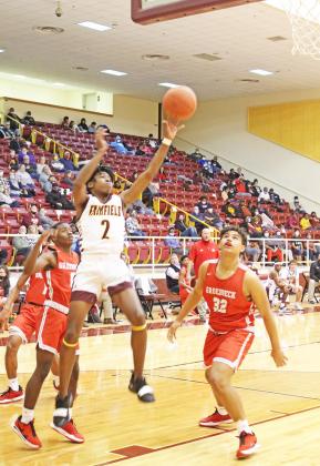 Junior DaKerione Cunningham puts of a basket for the Eagles on Friday night against Groesbeck. Photo by Mitchell Pate